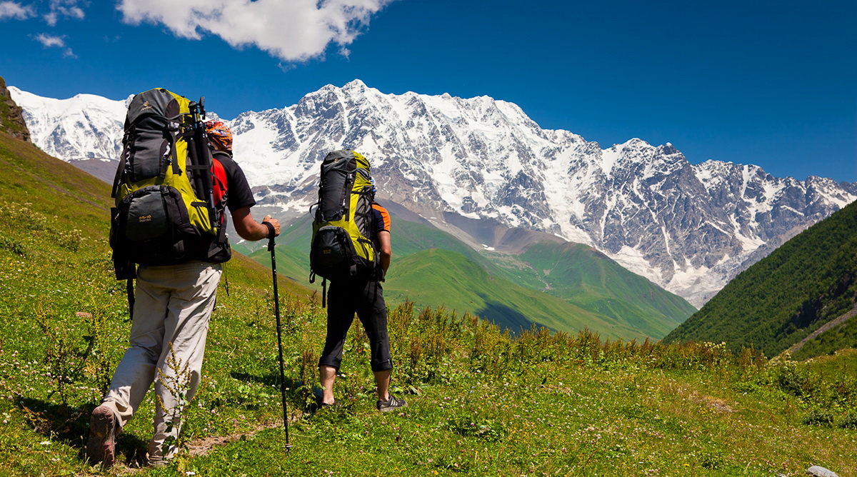Hikers on a mountain trail in Paro Valley