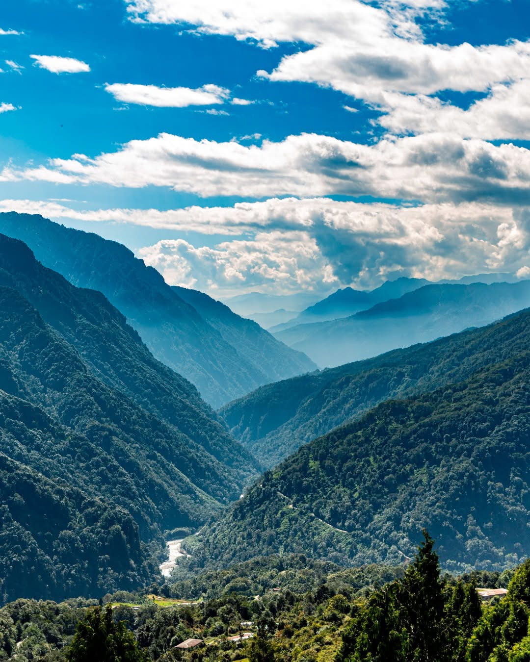Serene boat on a lake with mountain reflections