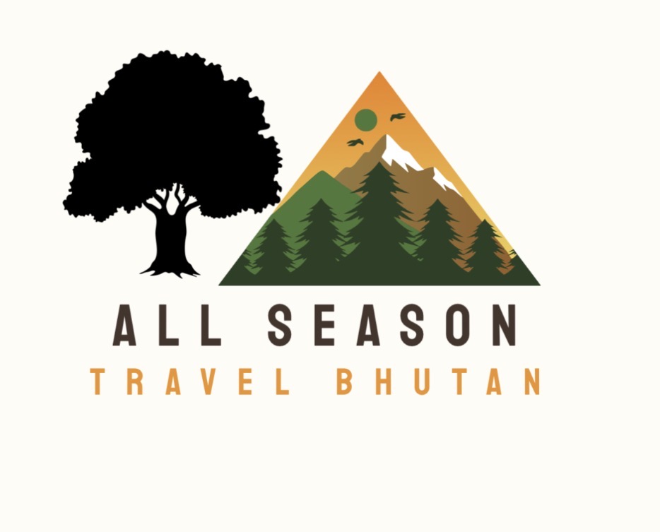 Karma, founder of All Season Travel Bhutan, smiling in traditional Bhutanese attire